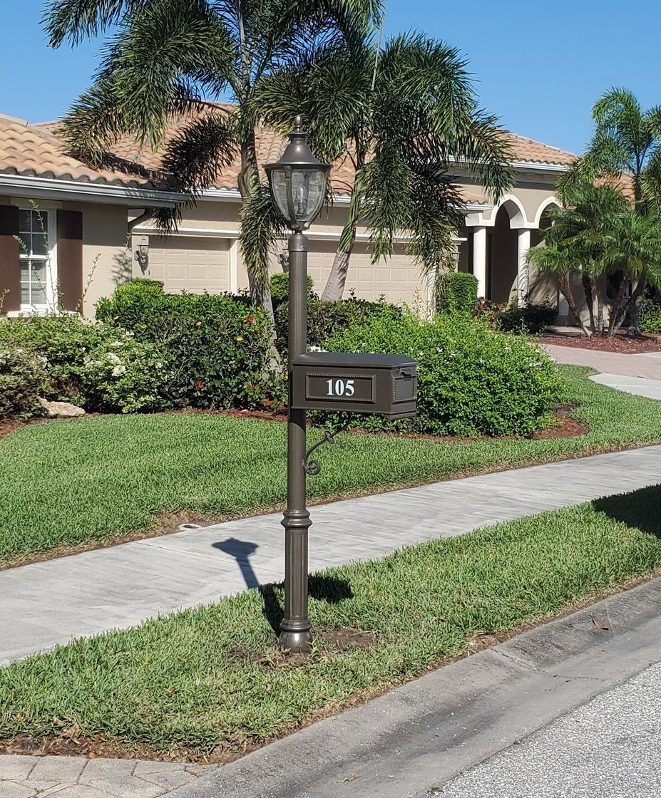 A mailbox with the number 103 on it