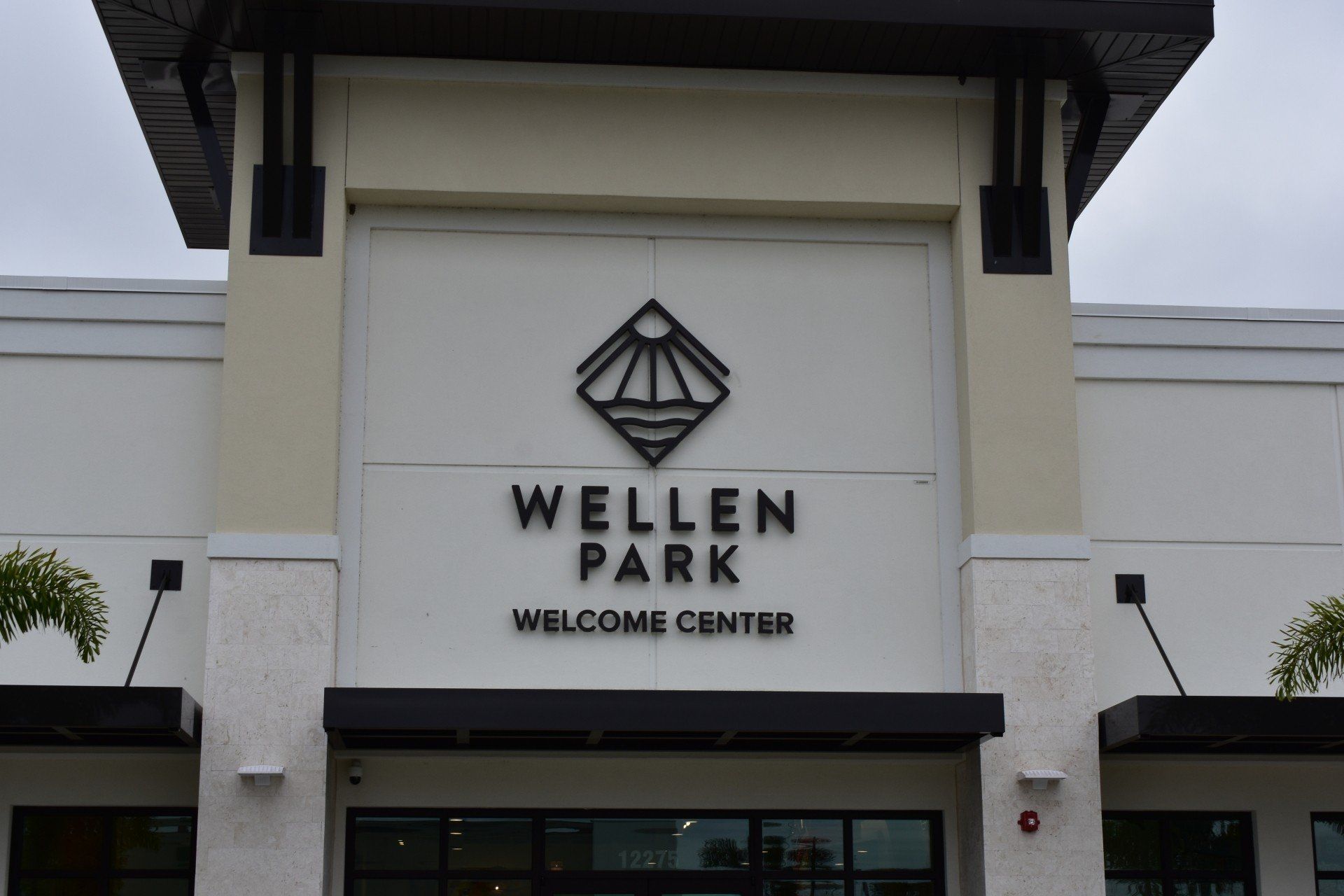 The wellen park welcome center is located on the side of a building