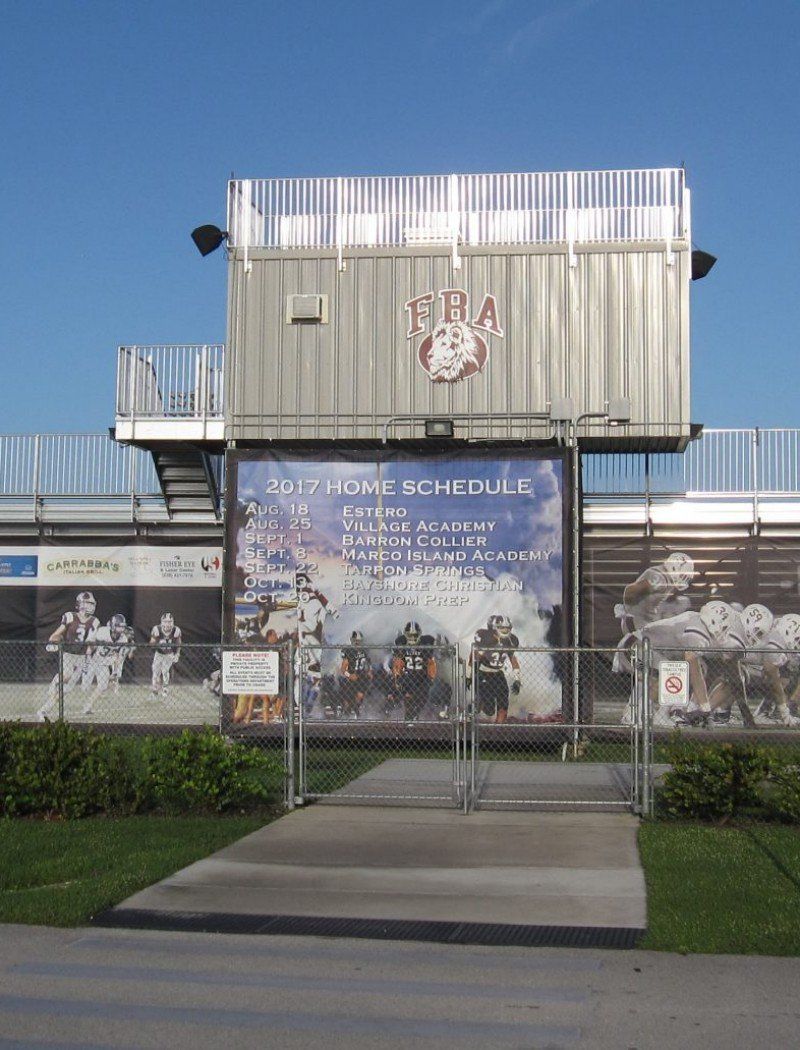 A building with a sign that says tropic schedule