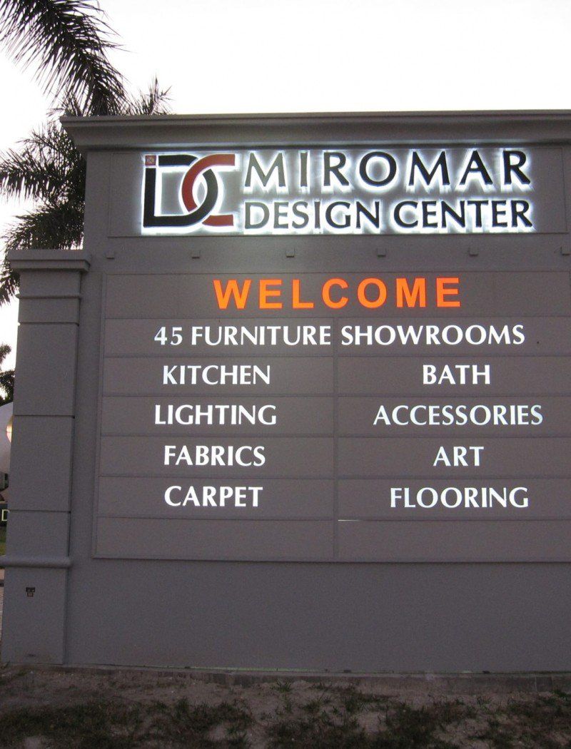 A sign for miromar design center welcomes you to their furniture showrooms