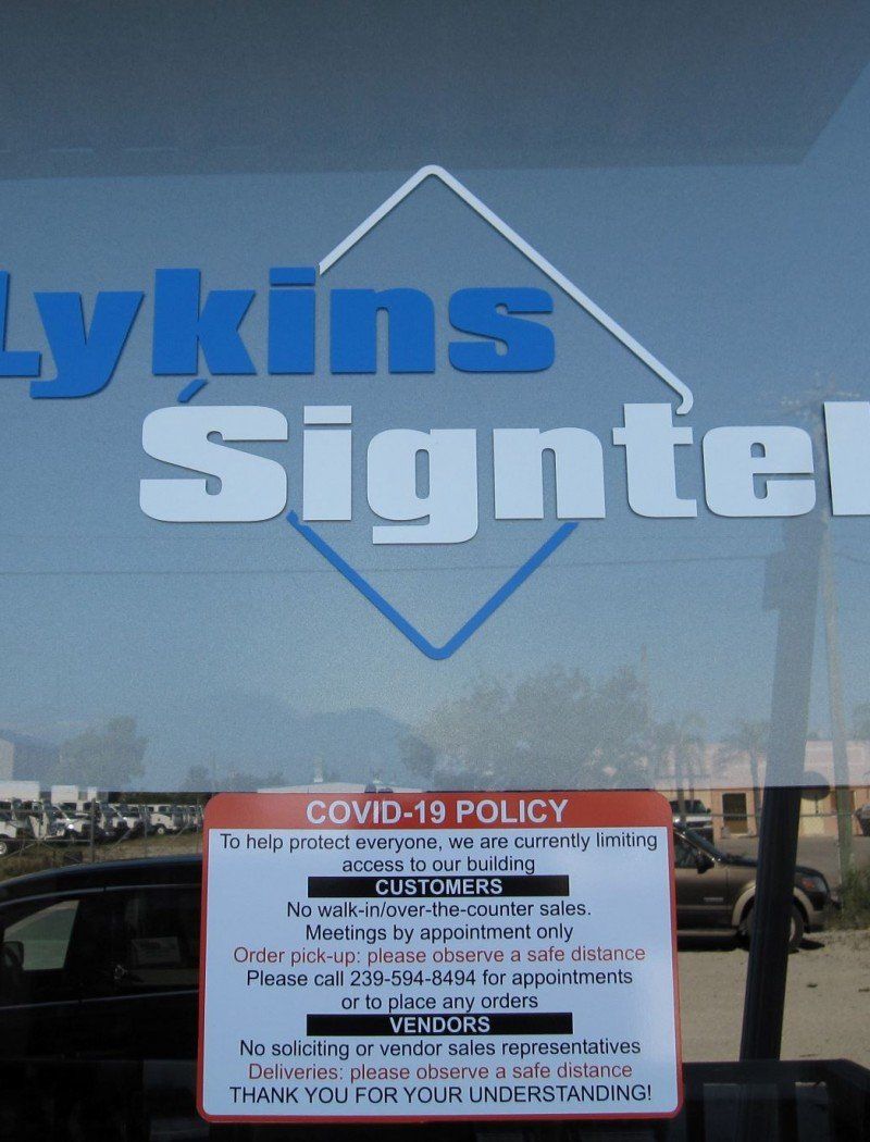 A sign that says lykins signtel on it