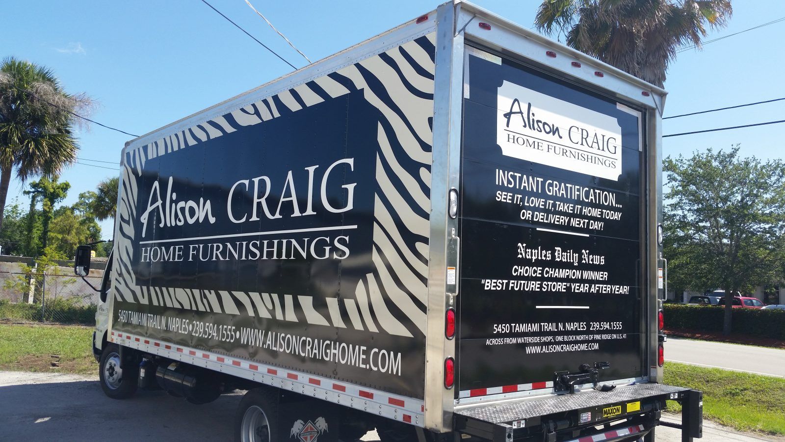Vehicle graphics on a box truck for Alison Craig Home Furnishings.