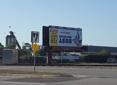 A billboard on the side of a road that says best home services for $ 19