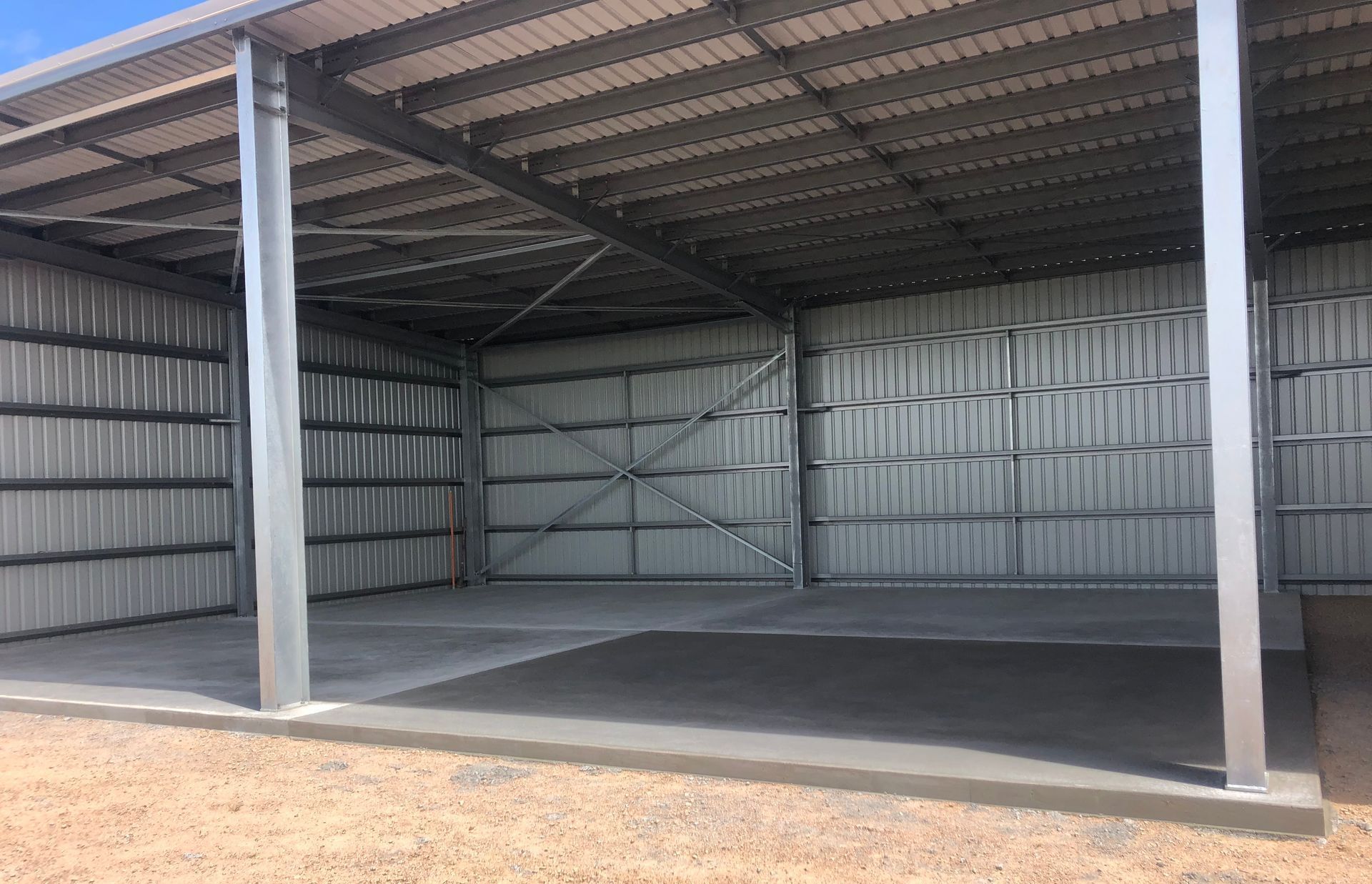Concrete Slab Being Poured for Shed Foundation in The Backyard — Fallon Constructions NQ in Fredericksfield, QLD
