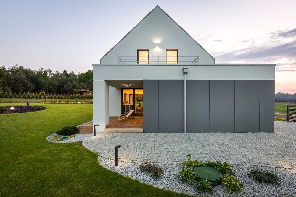 A Concrete Walkway Is Being Built in Front of A House — Fallon Constructions NQ in Fredericksfield, QLD