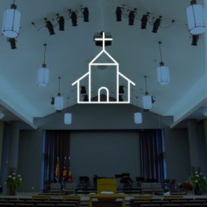 A church with a cross on the top of it. House of Worship Thumbnail.