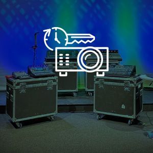 A room with a projector and a key on top of it.