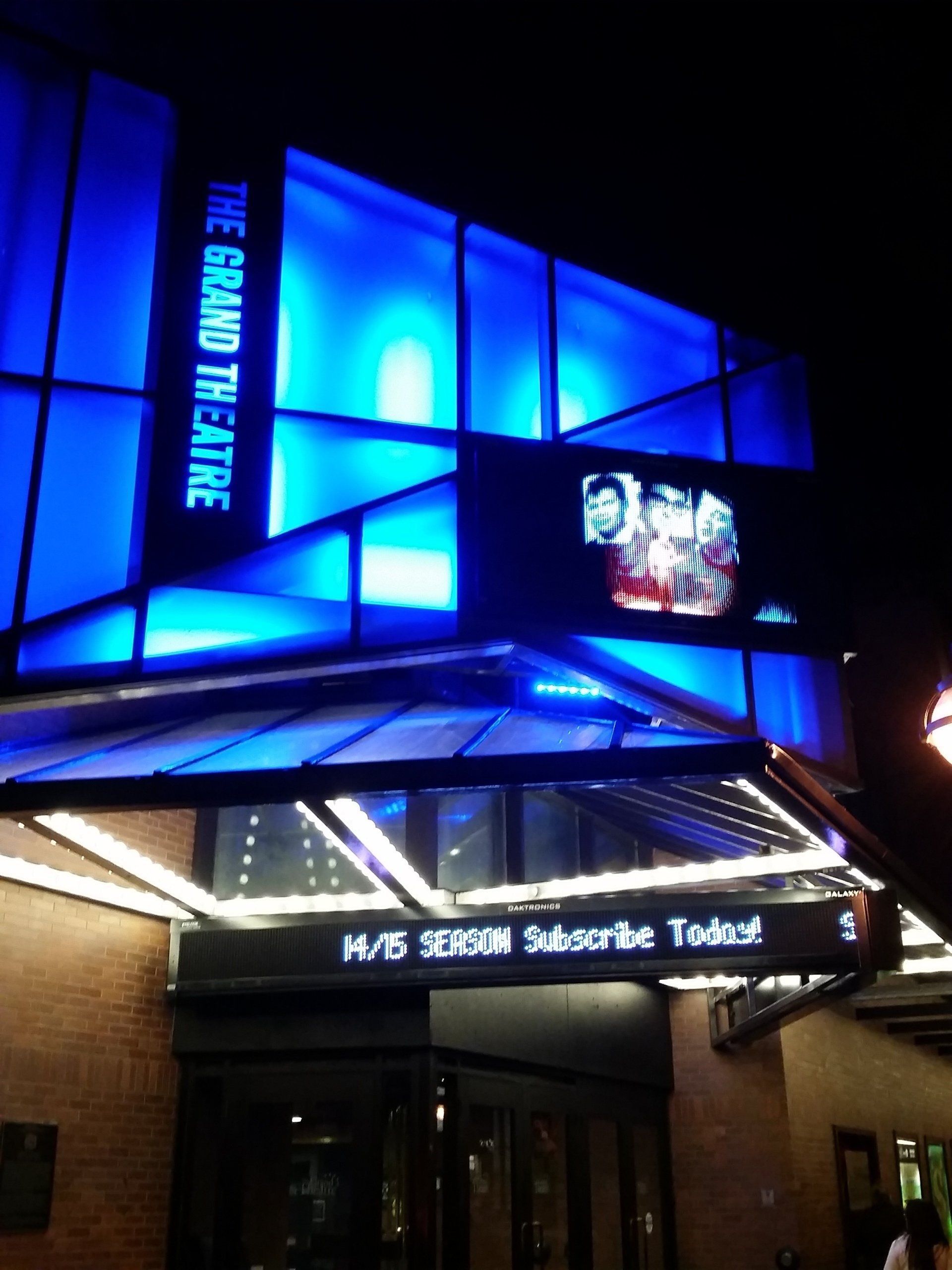 The grand theatre is lit up at night