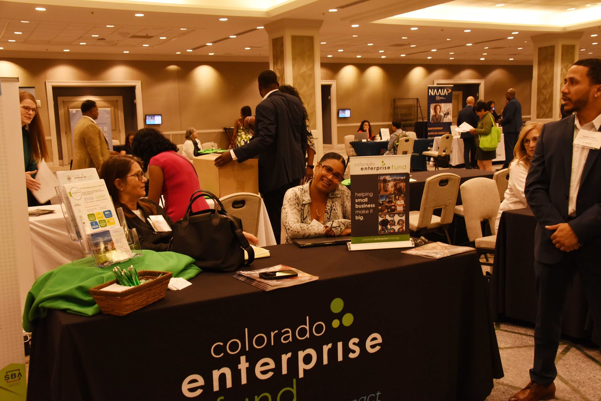 A table with a sign that says colorado enterprise on it
