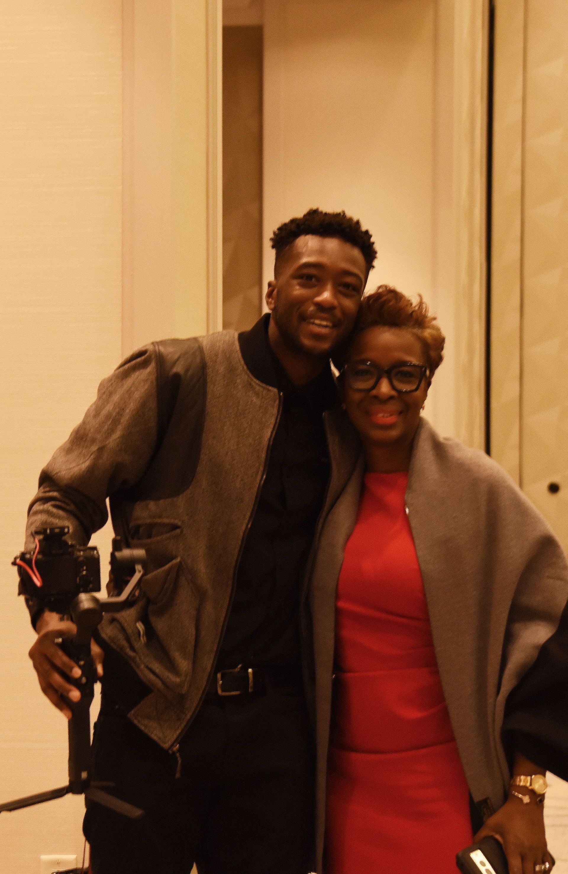 A man and a woman are posing for a picture together.