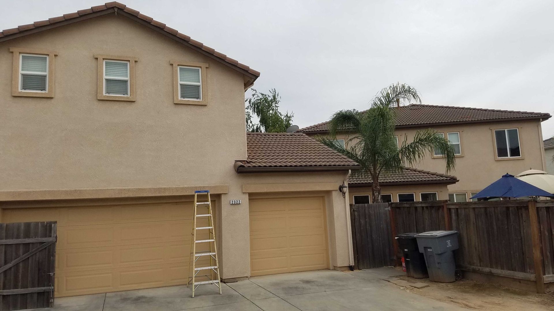A house with a ladder in front of it