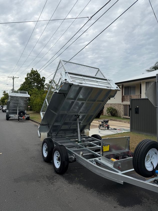 TrailerMates hydraulic tipper trailer raised in a Queensland driveway