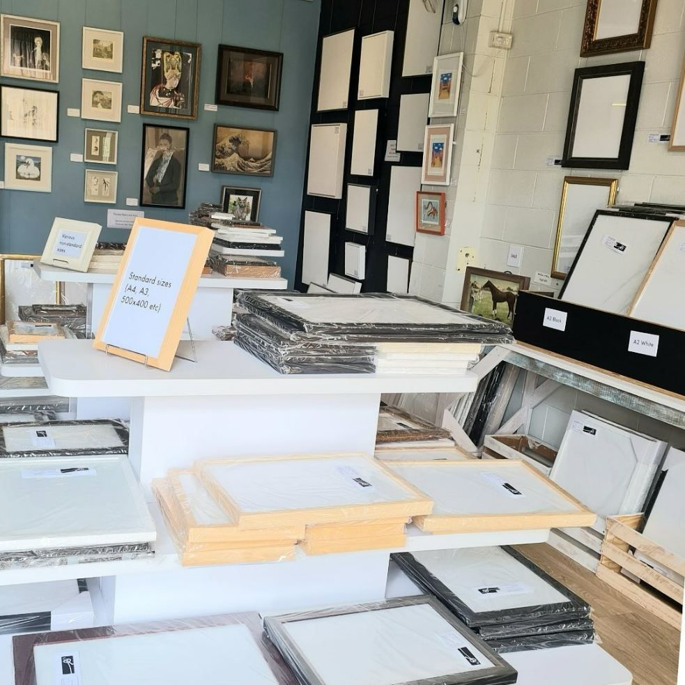 A Store Filled With Lots of Frames and Pictures — Next Level Picture Framing In Ballina, NSW