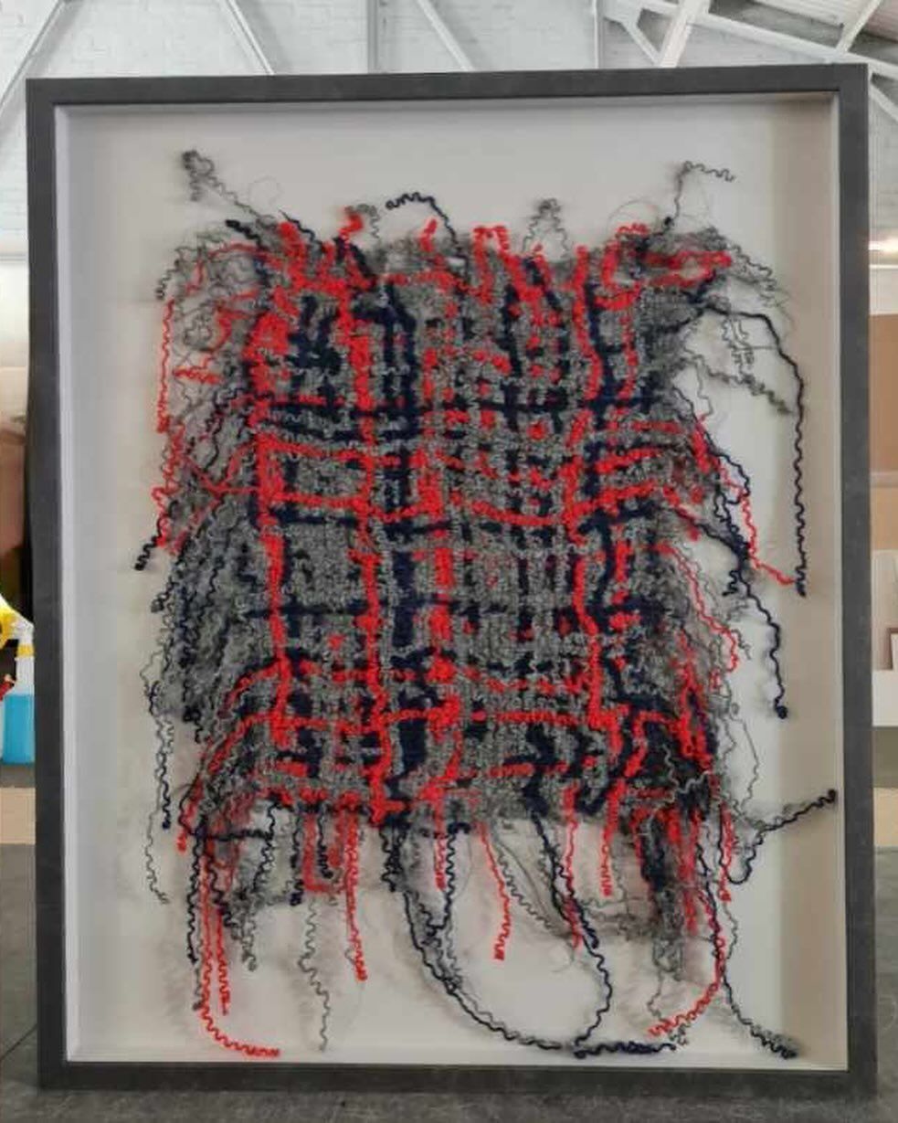A Framed Piece of Art With Red and Black Yarn — Next Level Picture Framing In Ballina, NSW