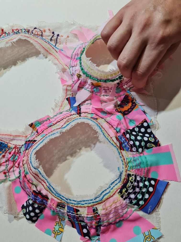 A Fabric Ring Above Two Circular Patterned Fabric — Next Level Picture Framing In Ballina, NSW