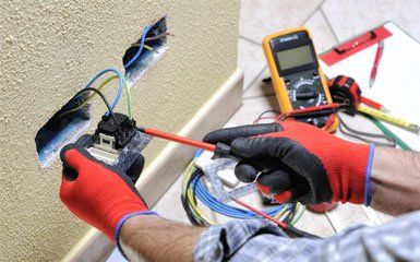 Man Repairs Electrical Outlet — Richland, PA — New Aire Tech LLC