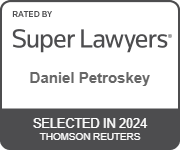 The logo for super lawyers daniel petroskey is selected in 2024 by thomson reuters.