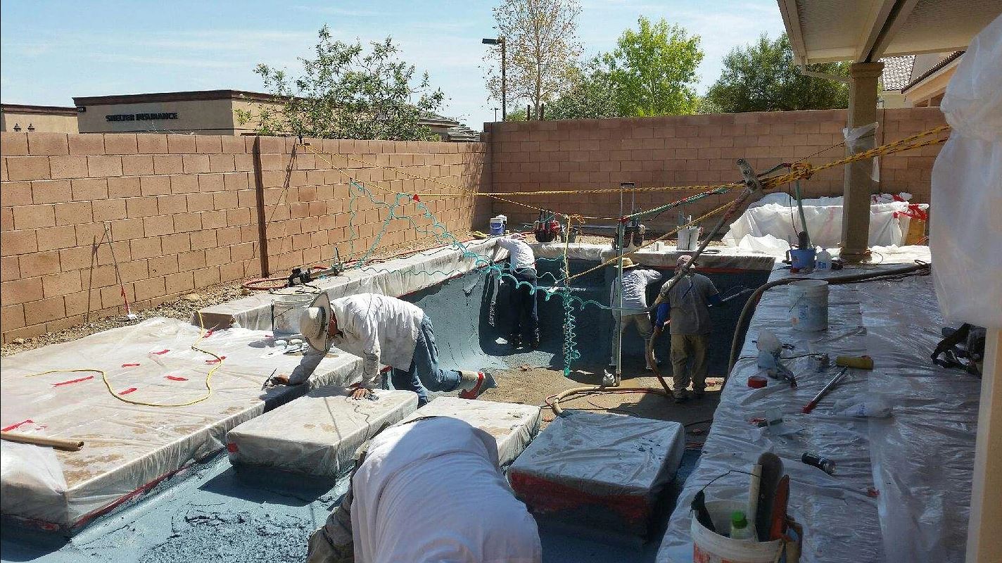 Workers Plastering Pool — Las Vegas, NV — R.O.W Custom Pool Plastering & Remodeling