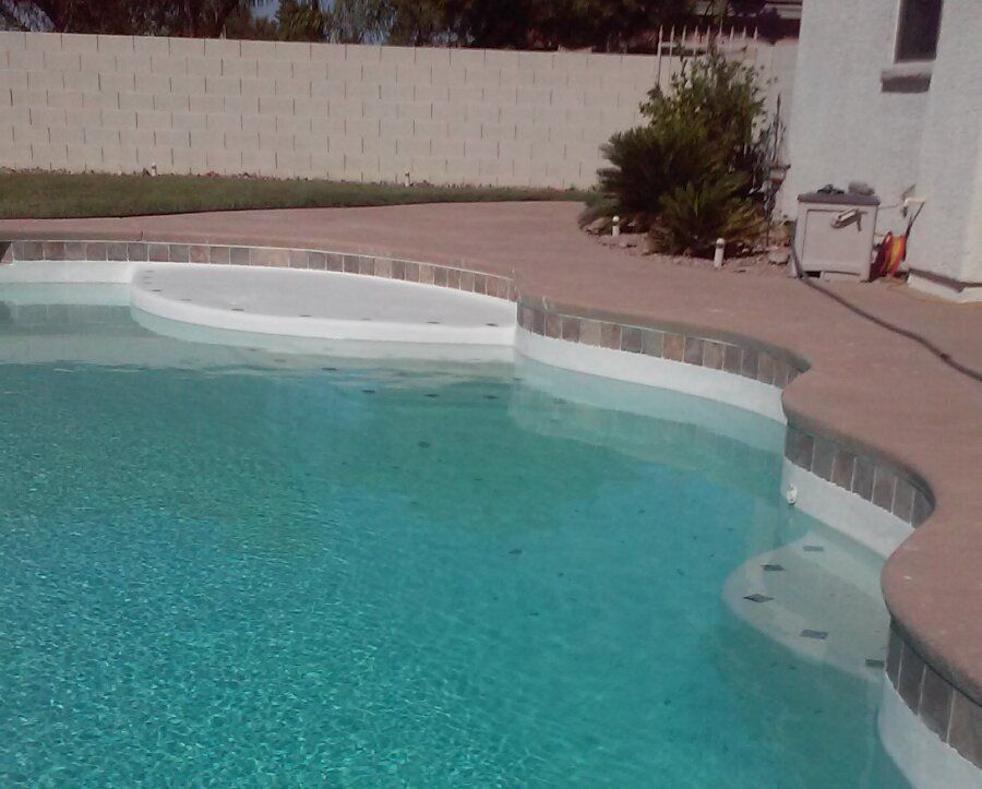 Swimming Pool Cleaning — Residential Curved Style Pool In Las Vegas, NV