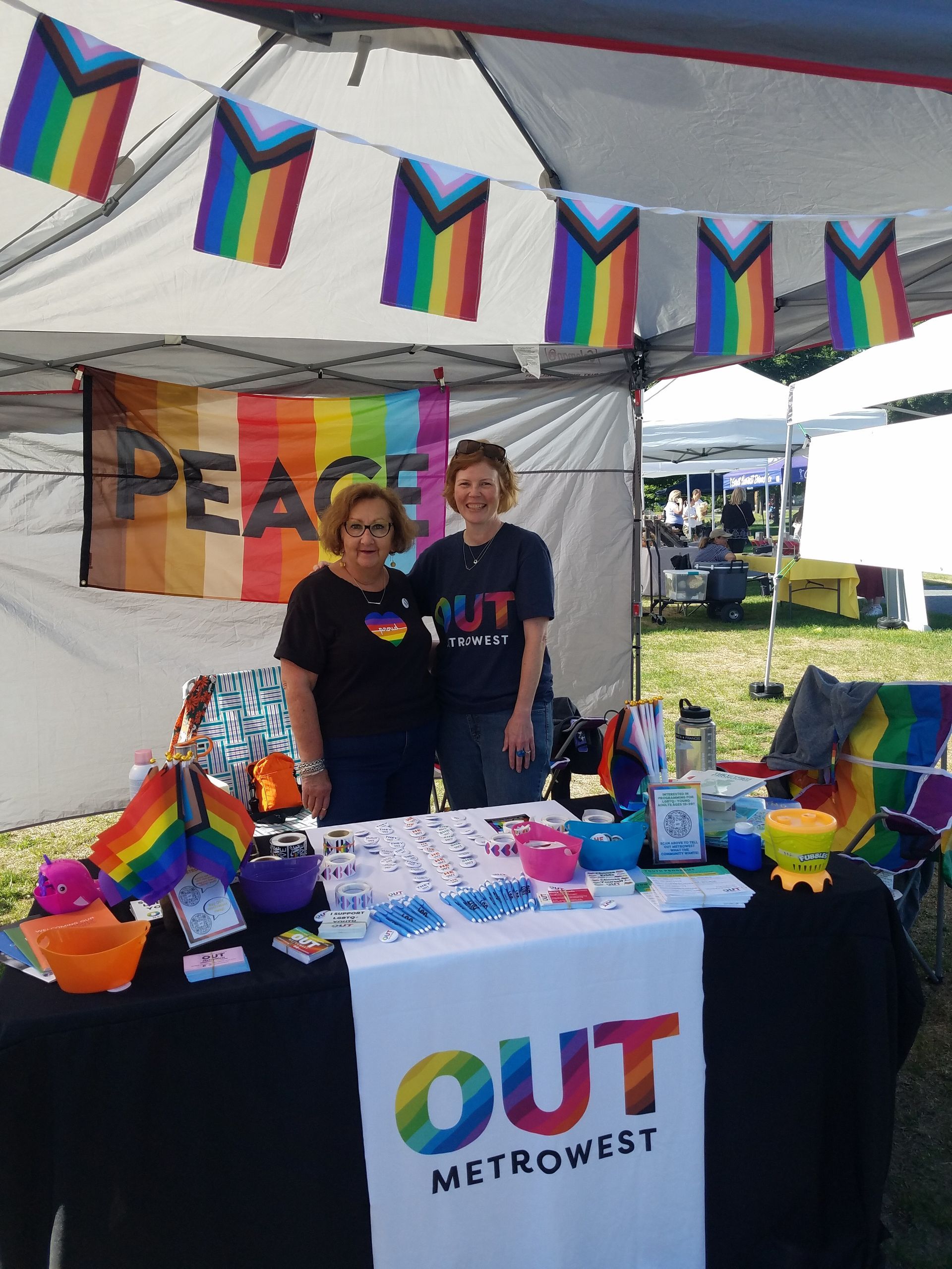 Group of people under a tent with 