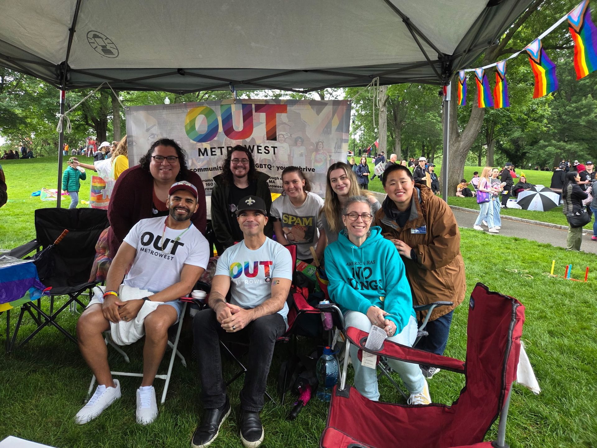 Group of people under a tent with an