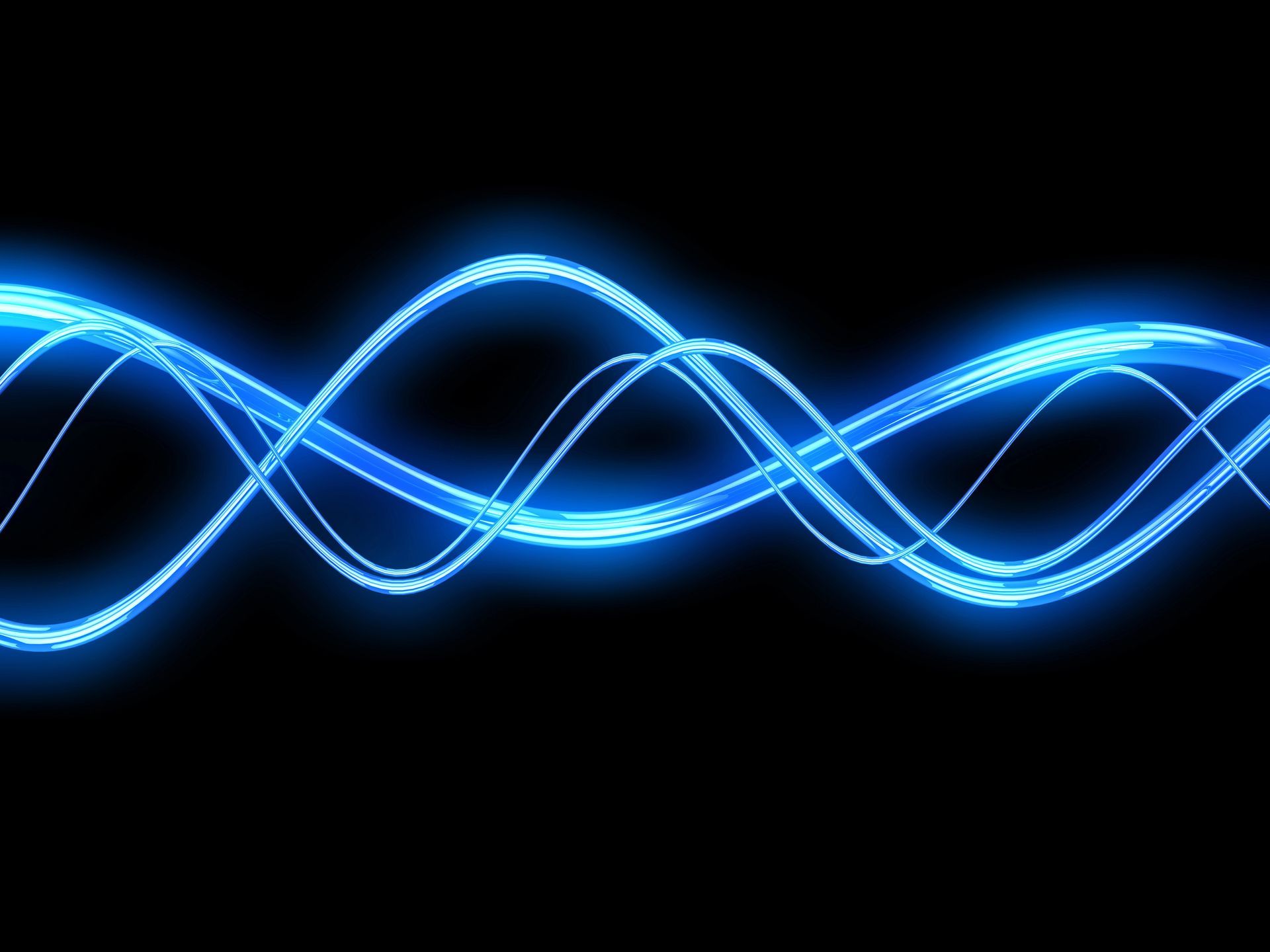 Blue glowing wavy lines against a black background, suggesting energy or sound waves.