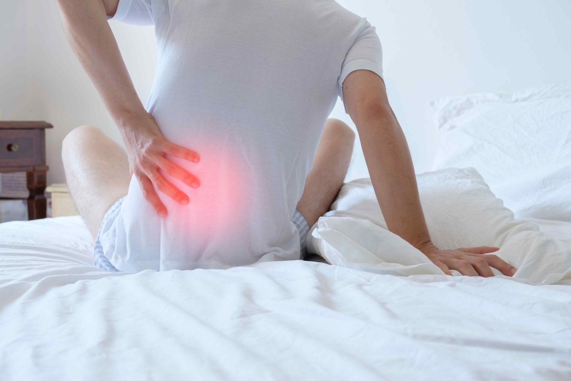 Patient Experiencing Low Back Pain that Needs Laser Therapy