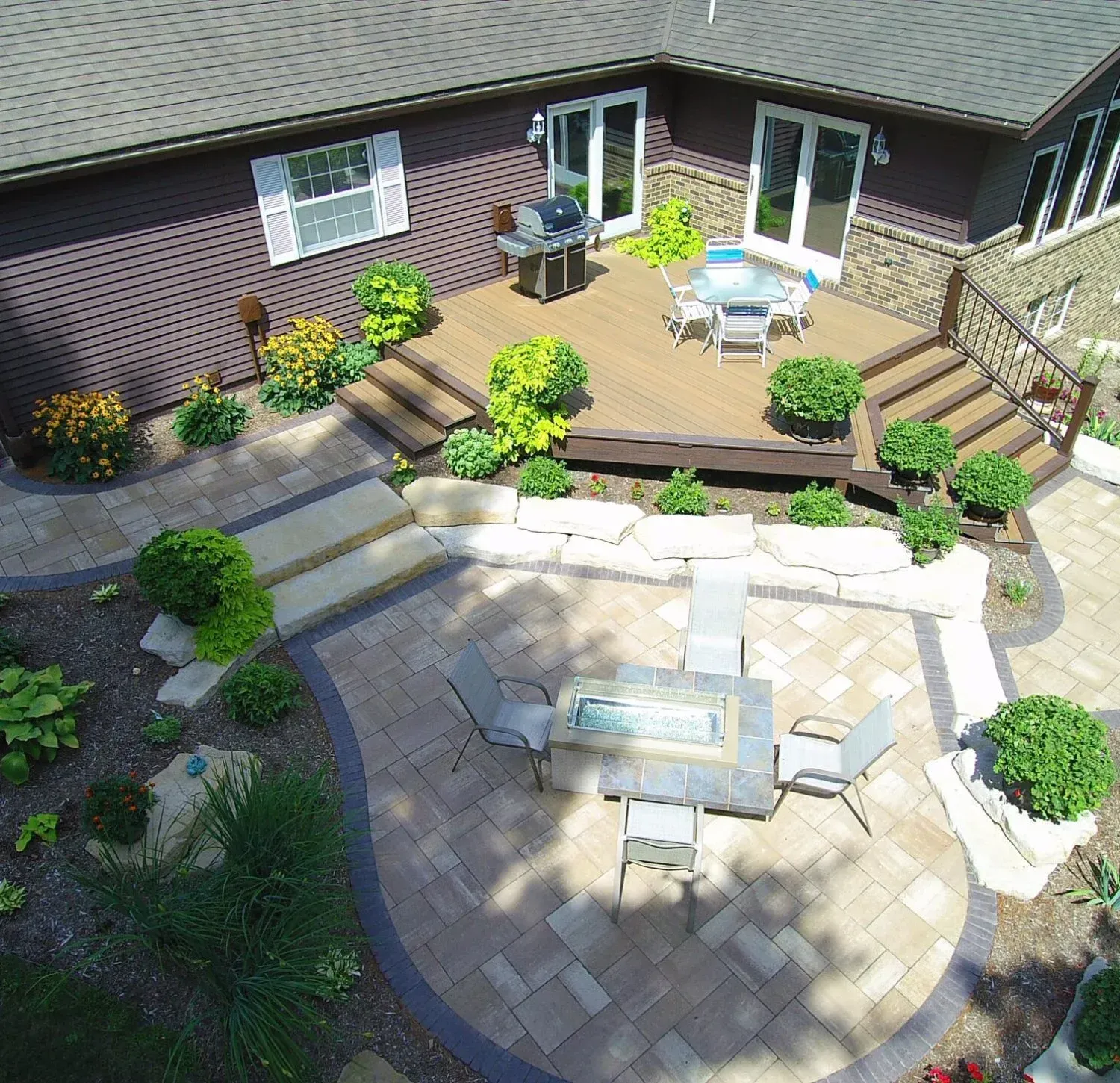 An aerial view of a patio with a table and chairs — Waterloo, IA — Matthias Landscaping Co