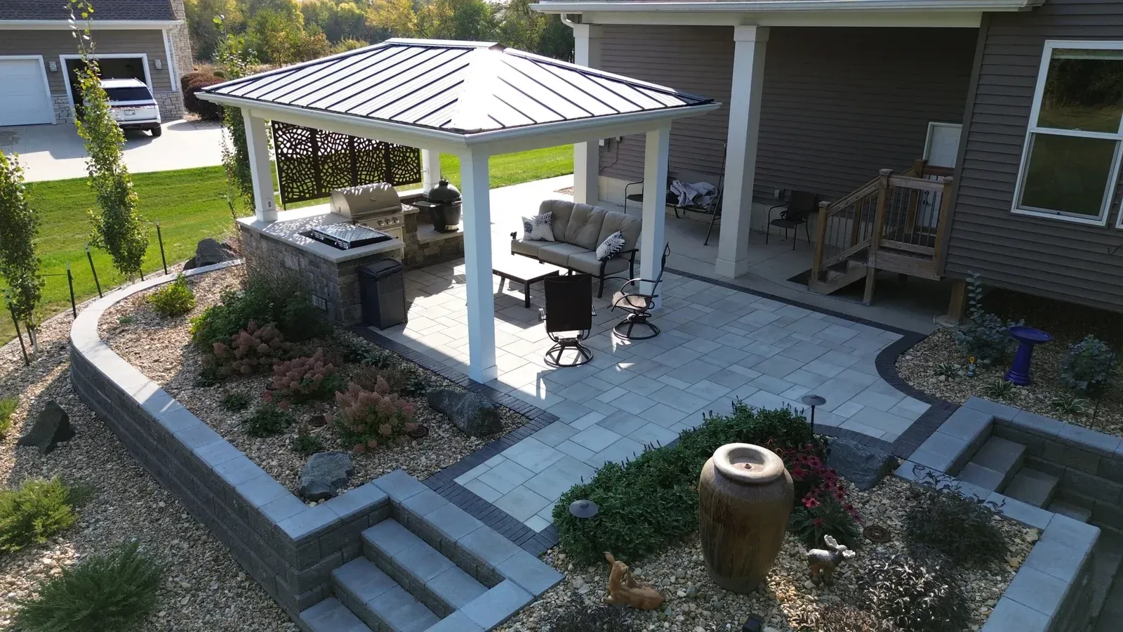 An aerial view of a patio with a gazebo and stairs — Waterloo, IA — Matthias Landscaping Co