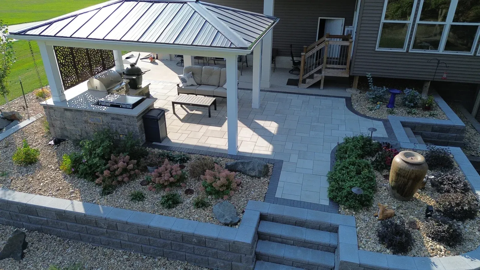 An aerial view of a patio with a gazebo and stairs leading to it — Waterloo, IA — Matthias Landscaping Co