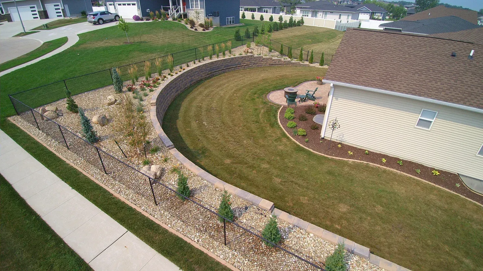 Aerial View of A House with A Lush Green Lawn — Waterloo, IA — Matthias Landscaping Co