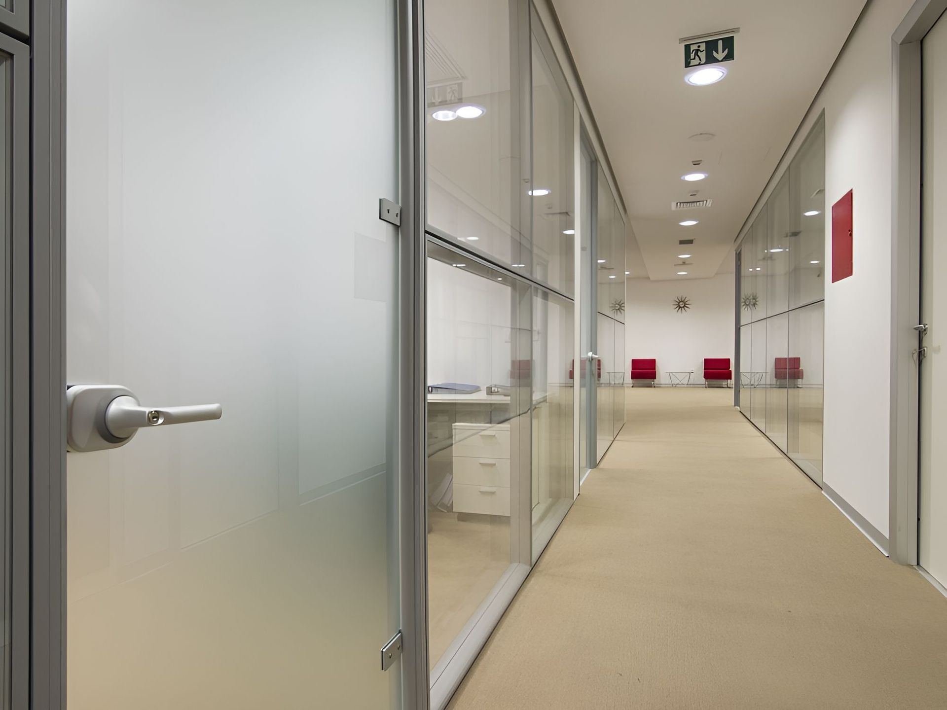 A Long Hallway With Glass Walls and Doors in an Office Building — Twin Cities Glass In Albury, NSW