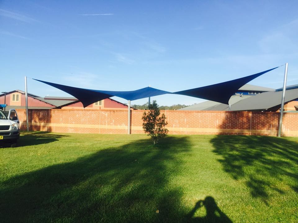 Colourful Shade Sale in Backyard — Design & Fabrication of Shades in Grafton, NSW