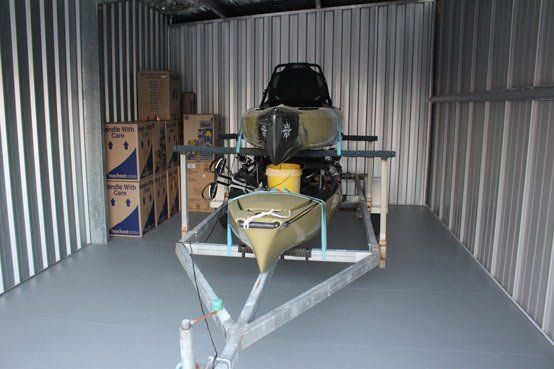 Sea Craft & Trailer in Storage Unit — Self Storage in Cooloola Cove QLD