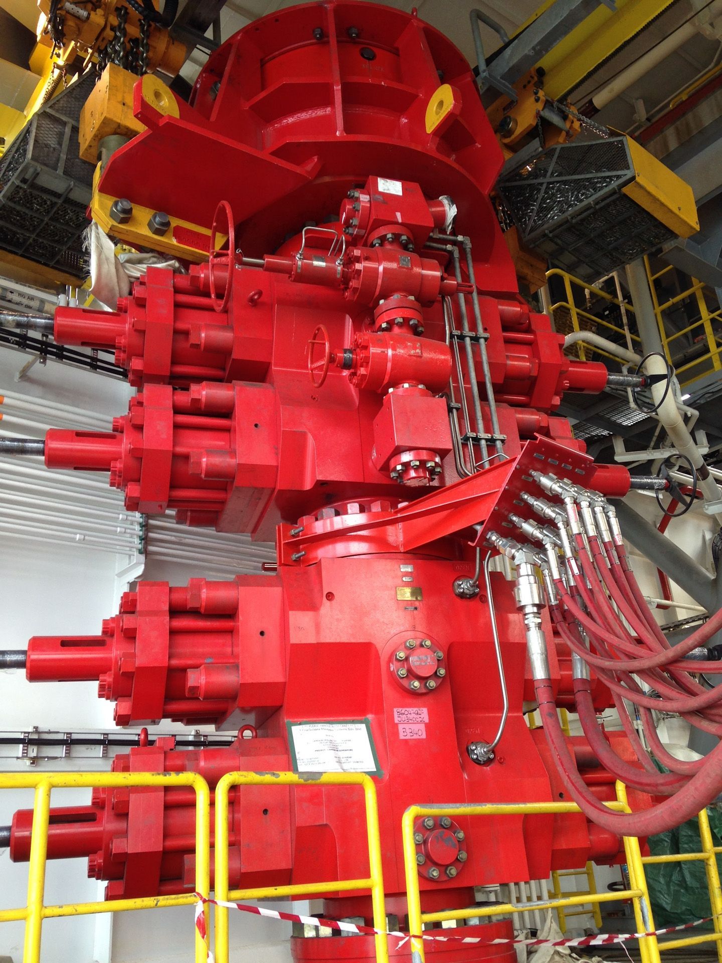 A large red blowout machine with  fence around it