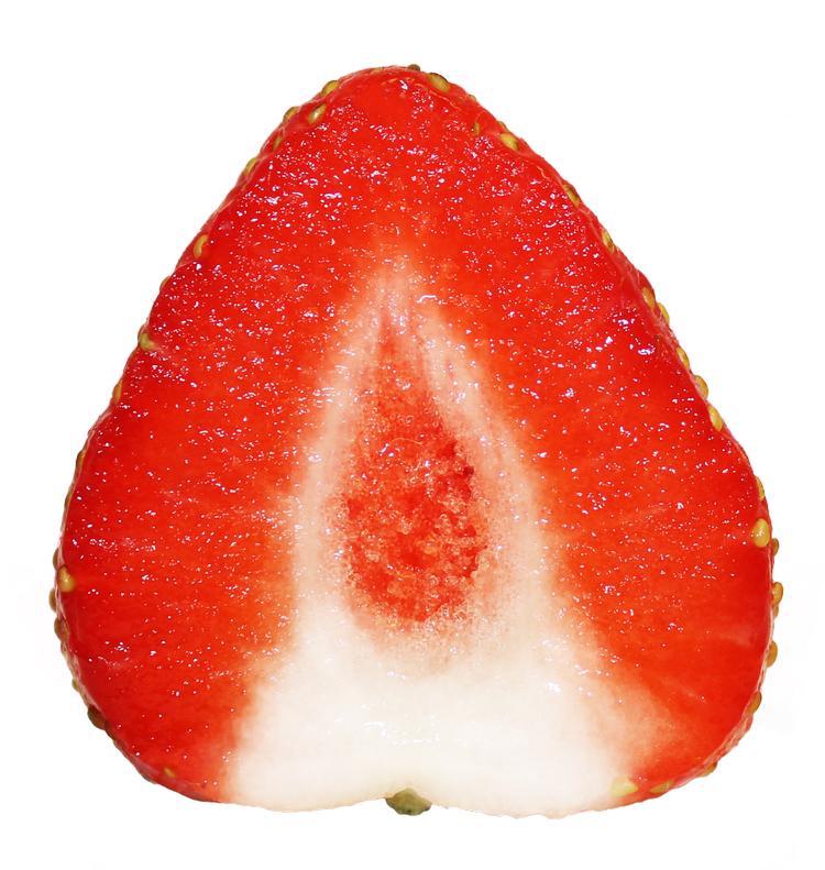 A strawberry cut in half shows the inside of the fruit