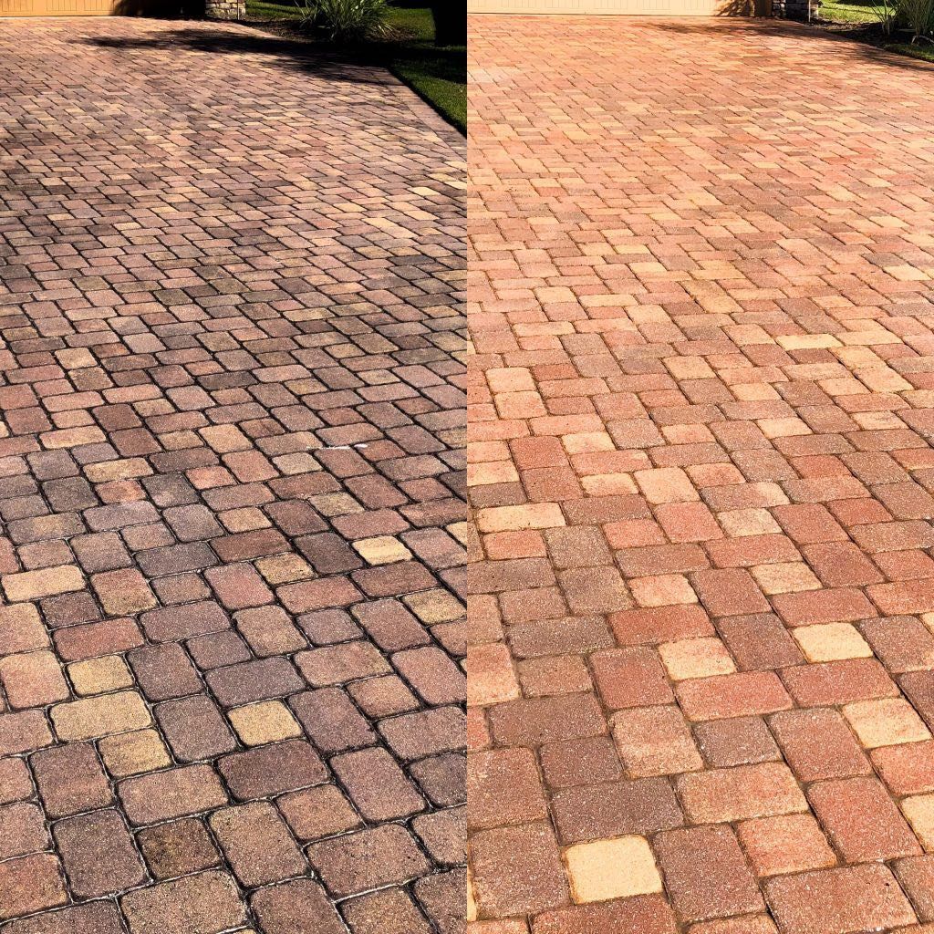 Comparison of a brick driveway before and after cleaning; left side is dirty and dark, right side is clean and lighter.