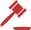 A red judge 's gavel is sitting on a white surface.