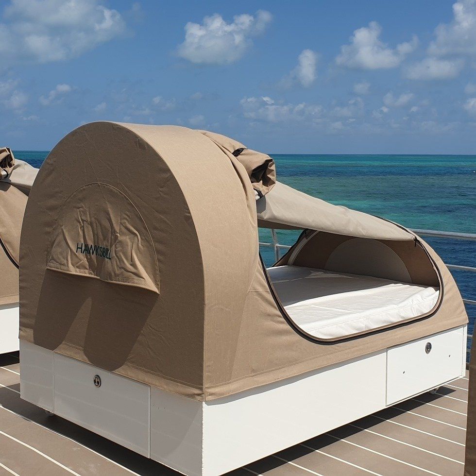 A Bed With a Tent on Top of It That Says 'Hawaii' on It — Coastal Coverings In Smithfield, QLD