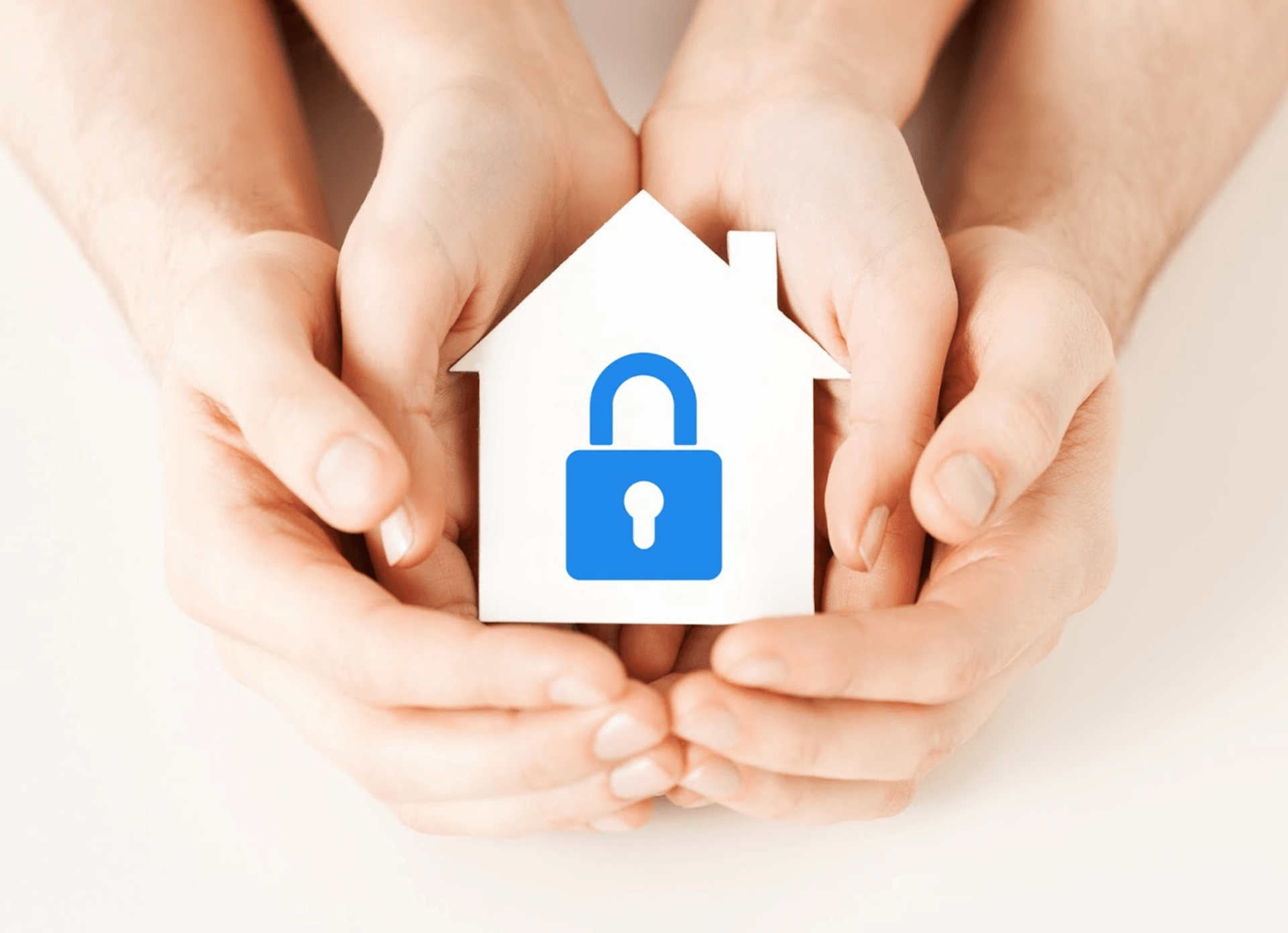 Two hands cupping a white house cutout with a blue padlock icon. Concept of home security.