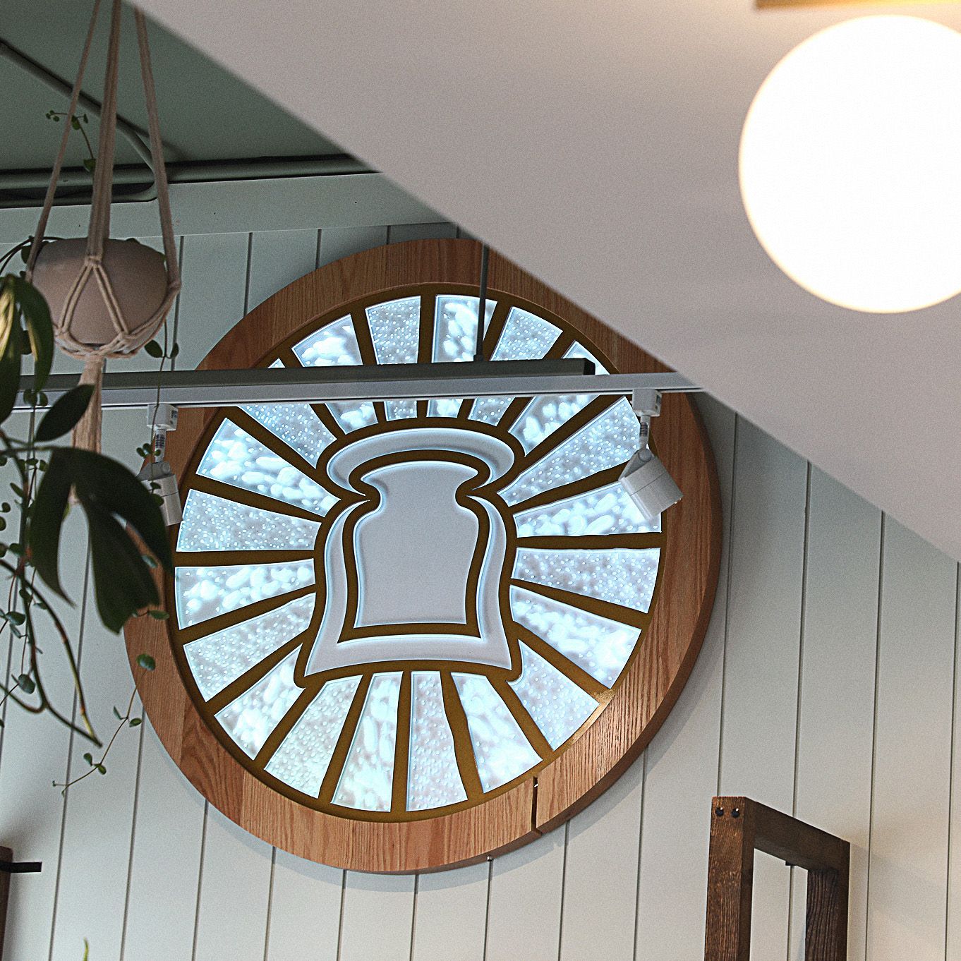 A round window with a picture of a loaf of bread on it