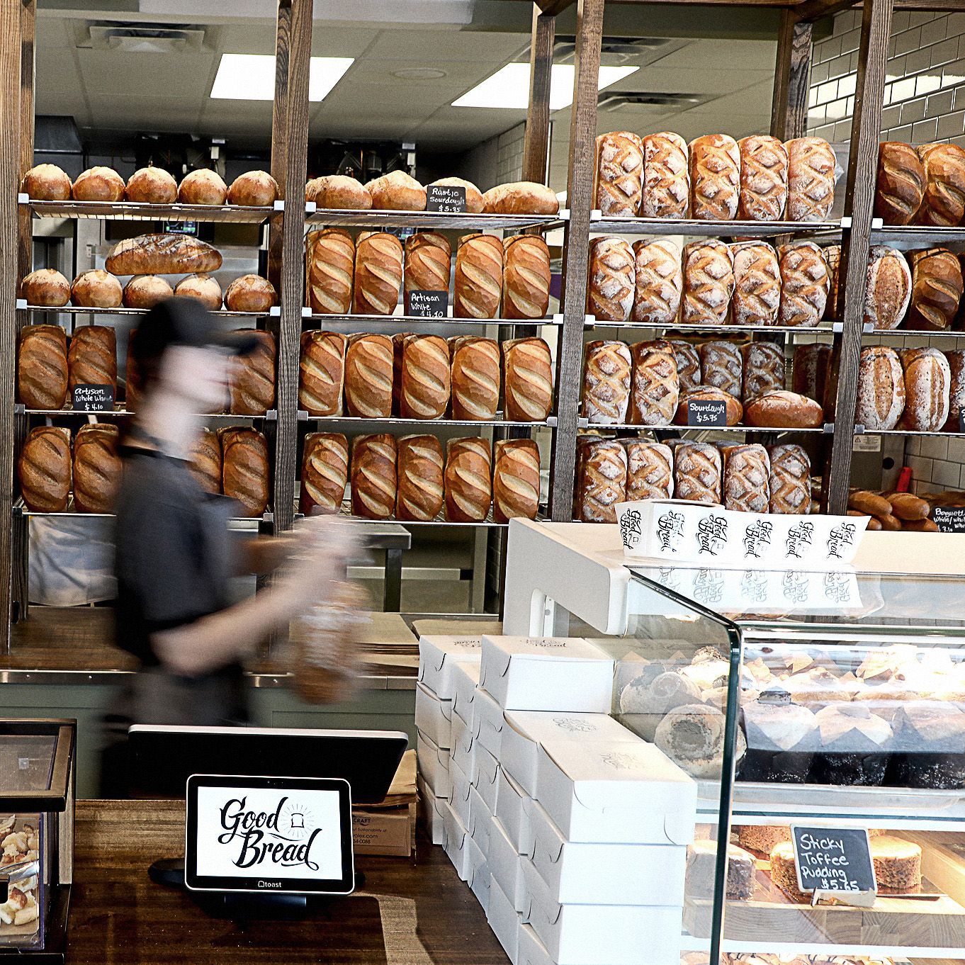 A bakery with a sign that says good bread