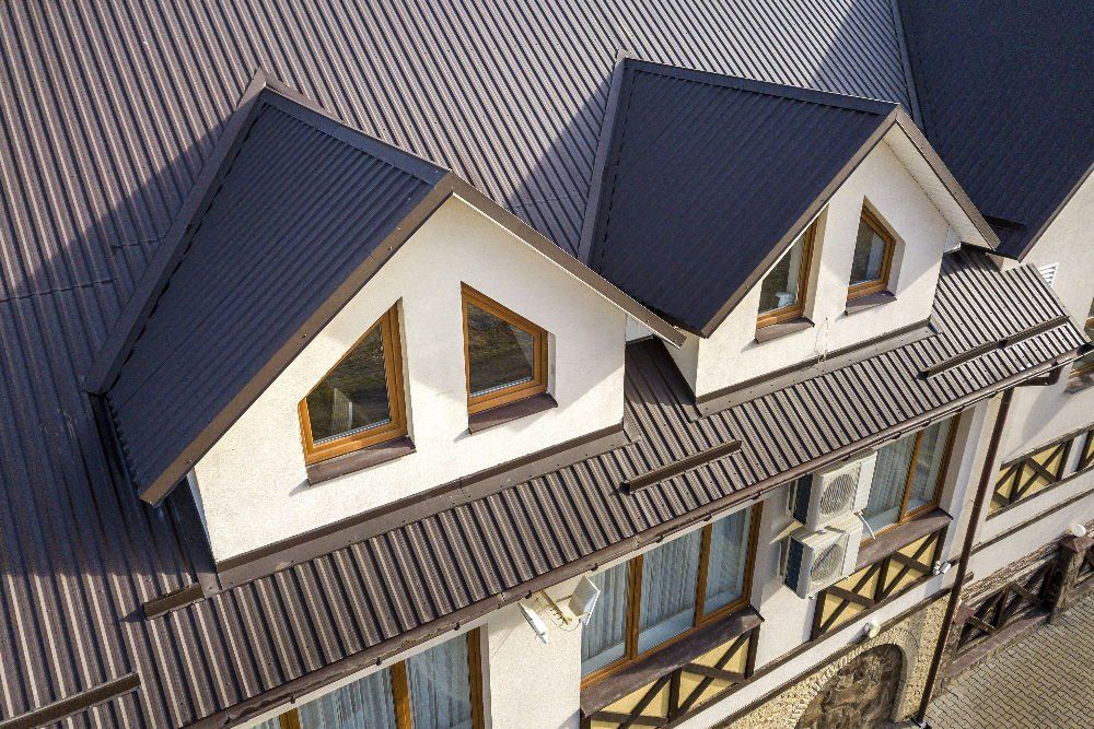 This photograph shows a photo of a beautiful as a perfect example of Commercial Metal Roofing Services