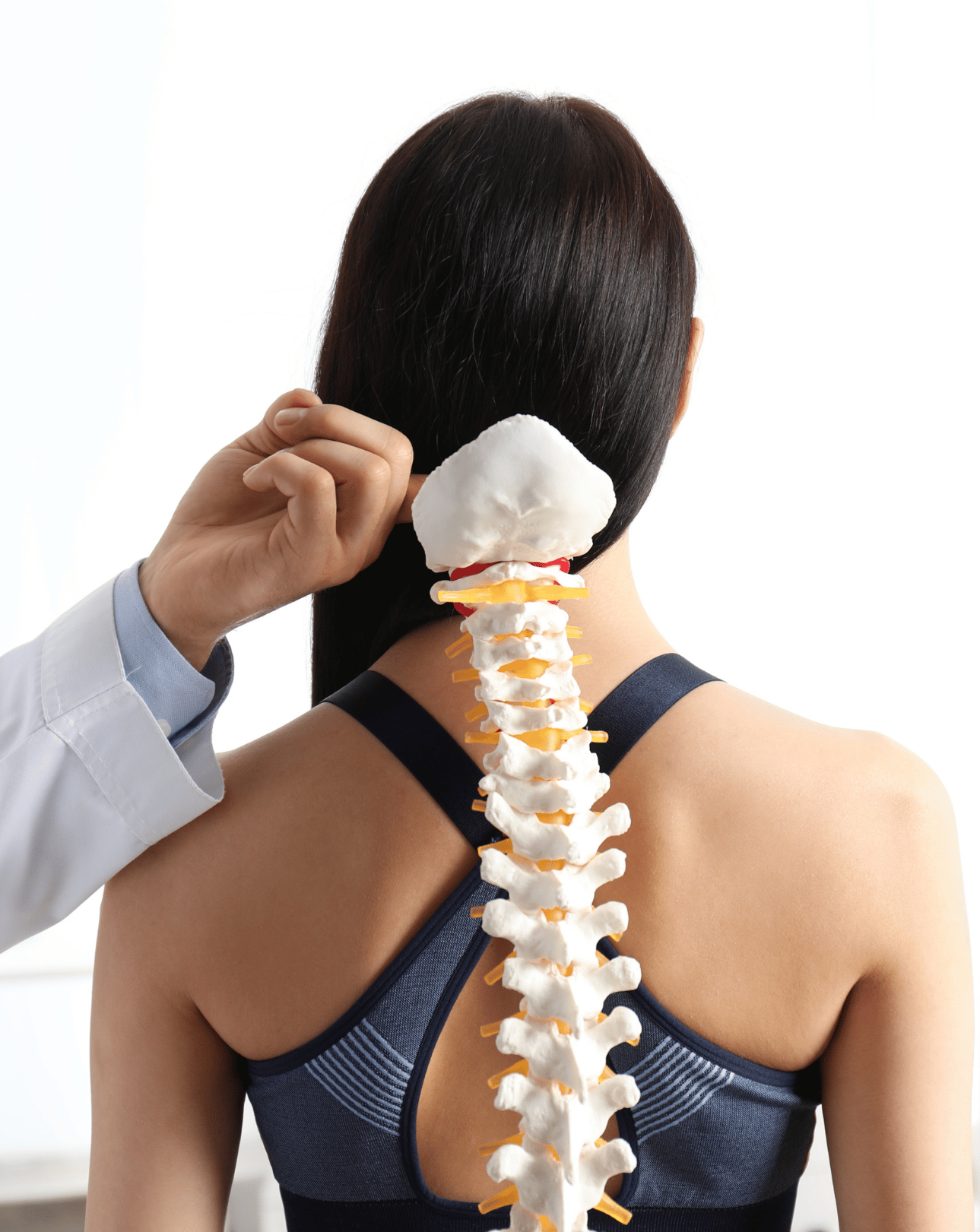 A woman is getting her neck examined by a doctor