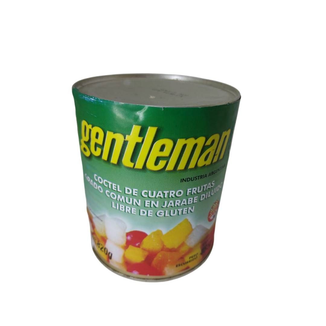 Lata de cóctel de frutas en almíbar marca 