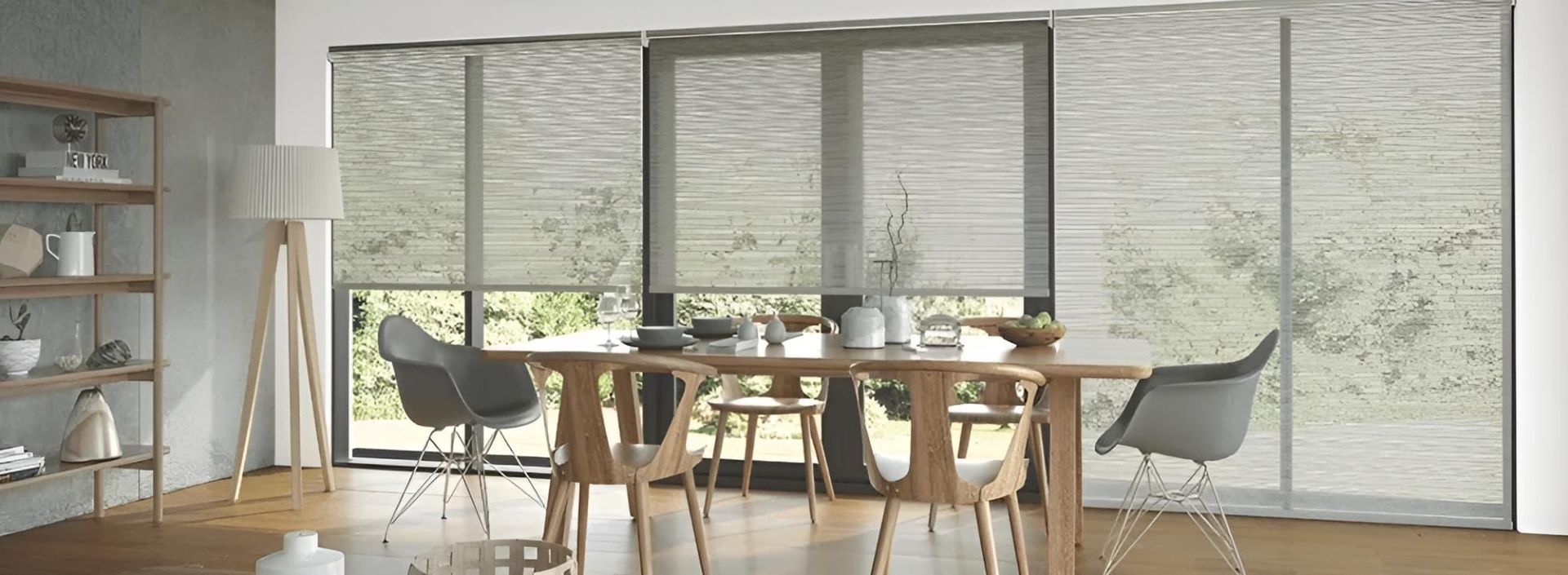 A Dining Room With a Table and Chairs and Sliding Glass Doors — Lismore Curtains & Blinds In Lismore, NSW