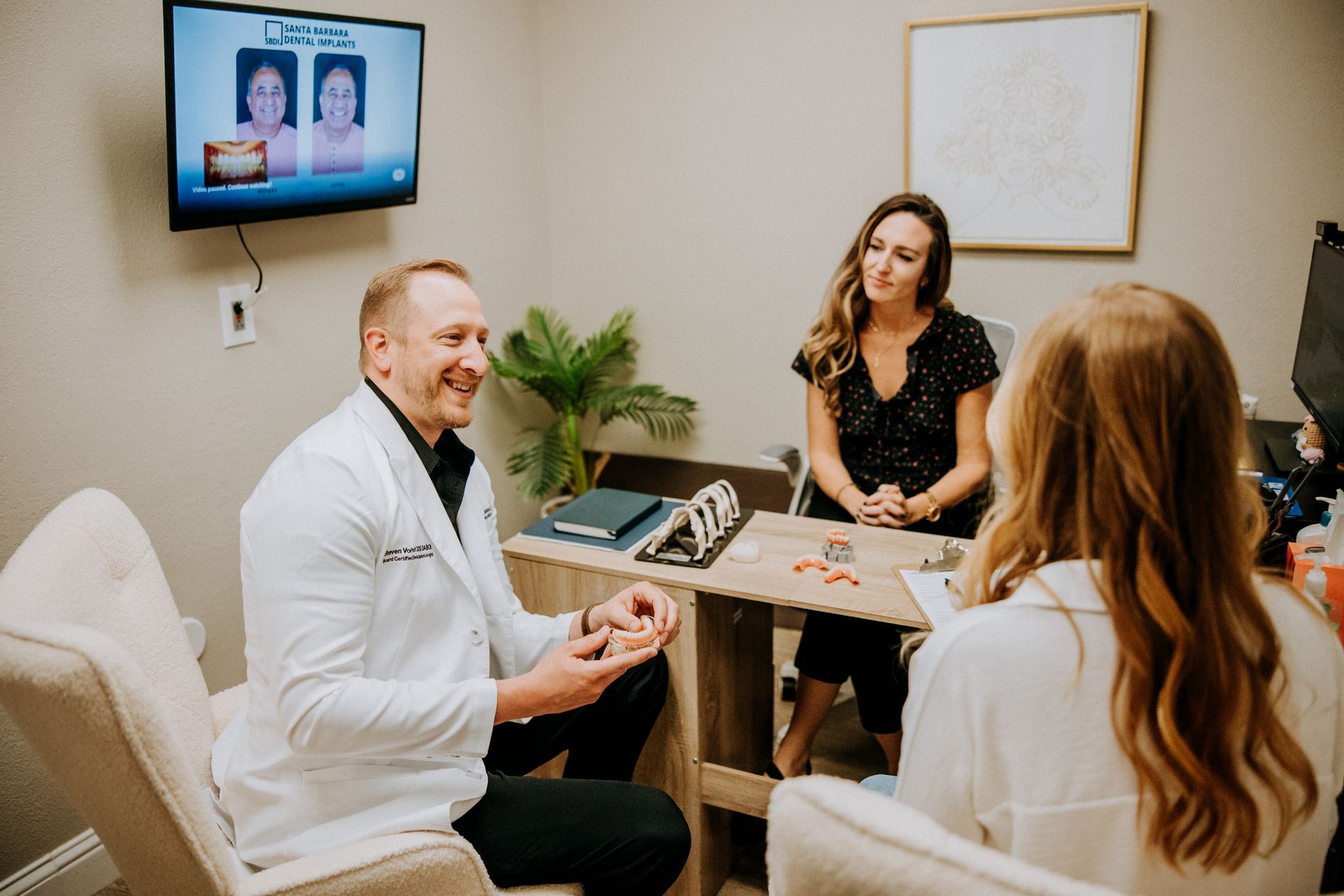 Steven Vorholt consulting with a patient 