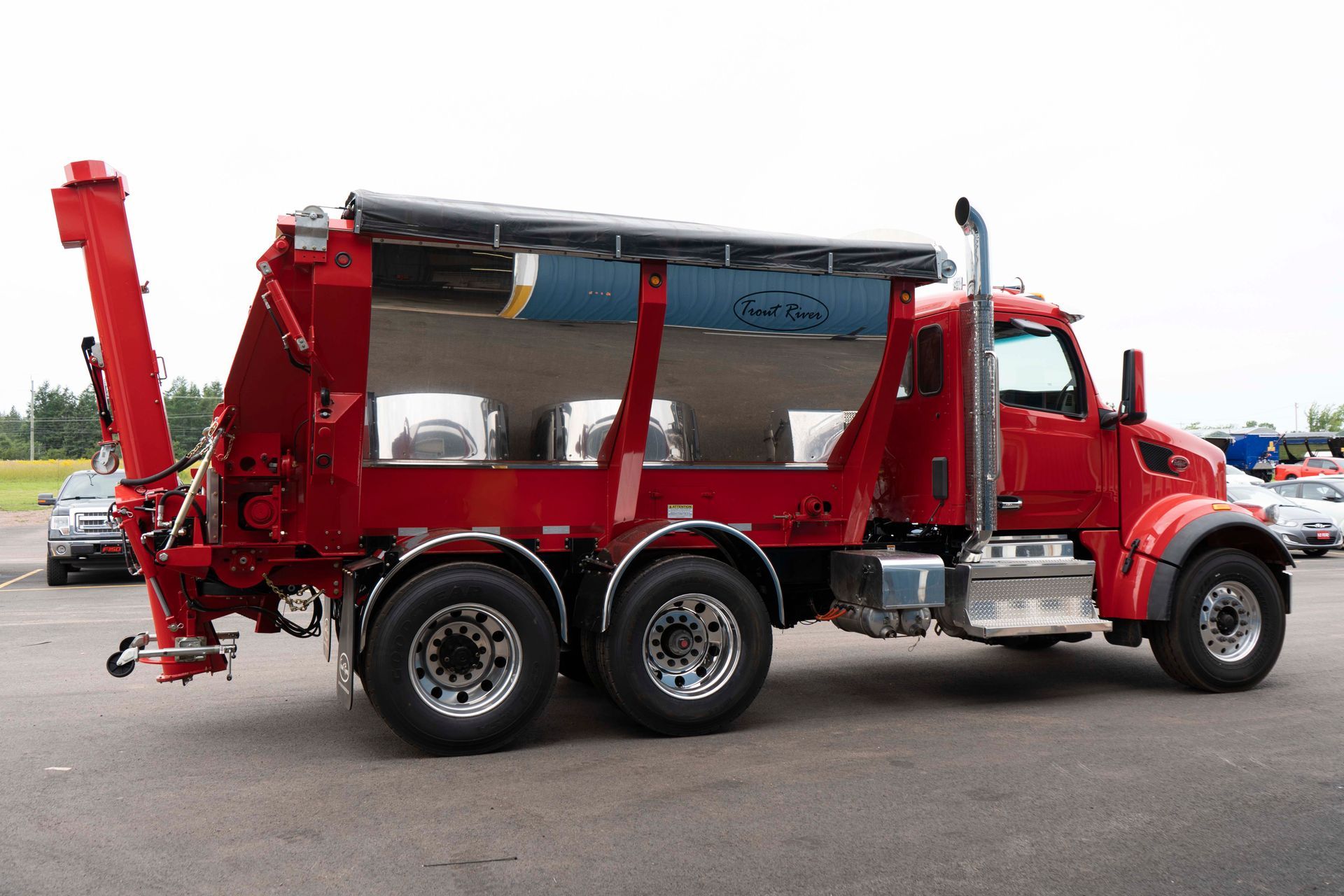 Trout River Industries truck-mounted live bottom auger side view