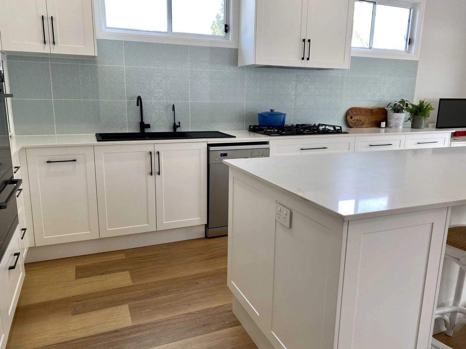 A Kitchen With White Cabinets — The Kitchen Centre In Tuggerah, NSW