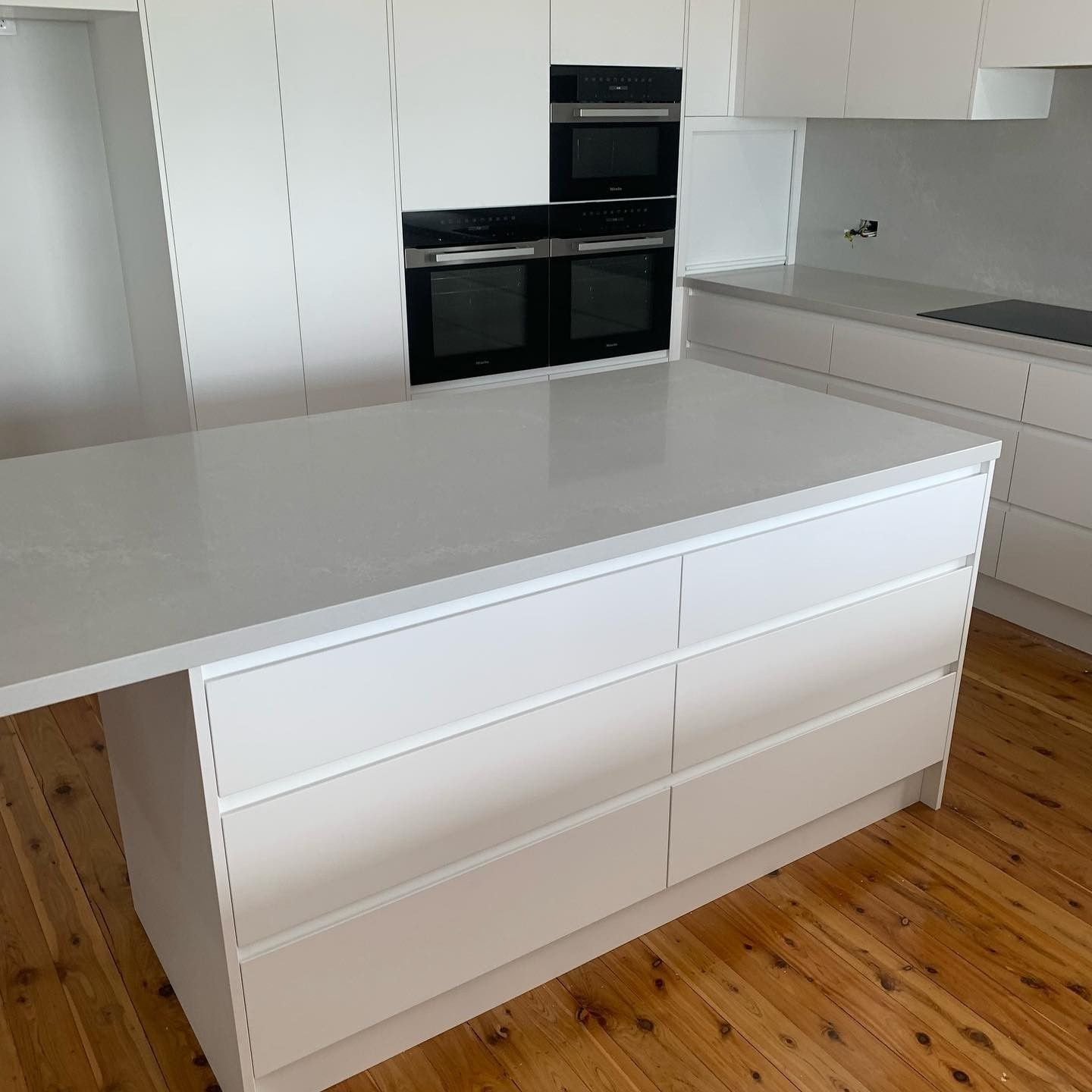 There is a Large Cabinet in the Middle of the Kitchen — The Kitchen Centre In Tuggerah, NSW